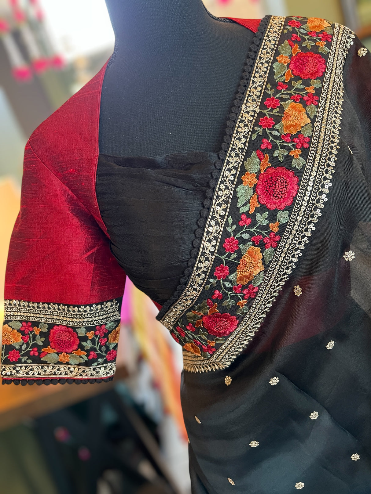 Designer black blouse with lightweight pure organza saree