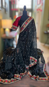 Black pure organza saree with elegant designer blouse