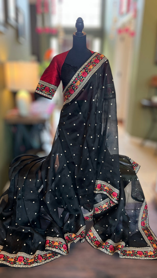 Black pure organza saree with elegant designer blouse