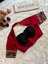 Elegant black organza saree complemented by designer blouse