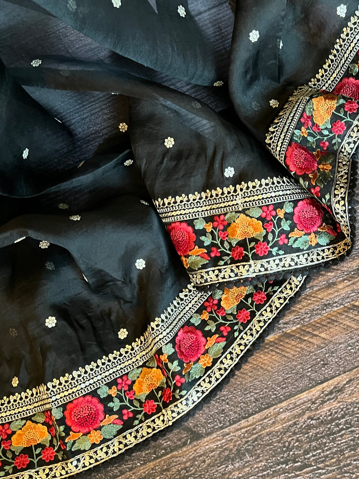 Black sheer organza saree with matching designer blouse