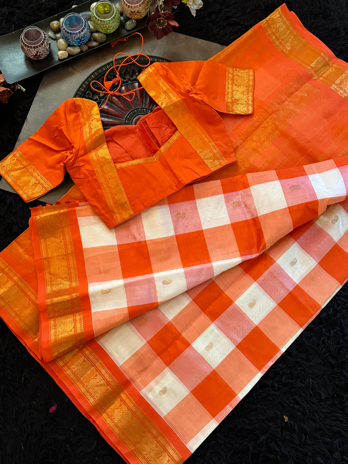 Orange checks Kanchi Seco