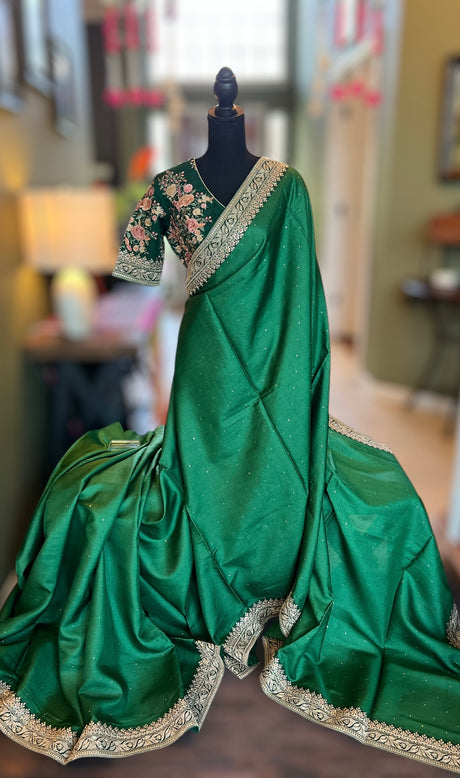Green Tussar silk saree with heavy embroidered blouse